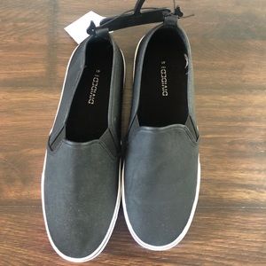 H&M brand new with tags black slip ons